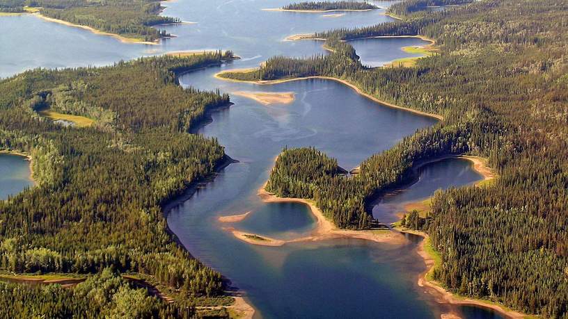 De Yukon is een aaneenschakeling van bossen en meren zover je kunt kijken